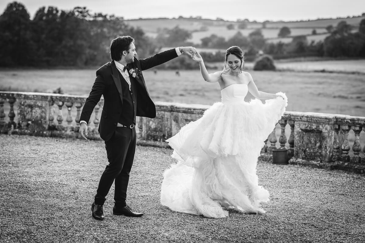 Close up of Groom kissing the Bride on her cheek taken by Photography by Chantel